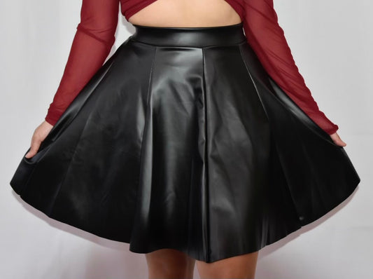 Cristal faux leather flare mini skirt.